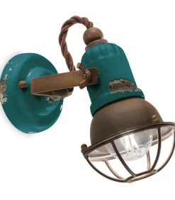 Houston, Applique Di Ferroluce In Ceramica Finitura Anticata Vintage Con Dettagli In Metallo Corten.