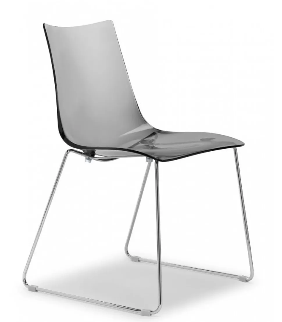 Sedia Zebra Antishock Di Scab, Con Scocca In Policarbonato E Gambe A Slitta In Acciaio Cromato.