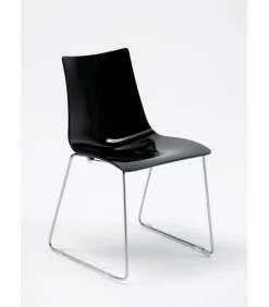 Sedia Zebra Antishock Di Scab, Con Scocca In Policarbonato E Gambe A Slitta In Acciaio Cromato.