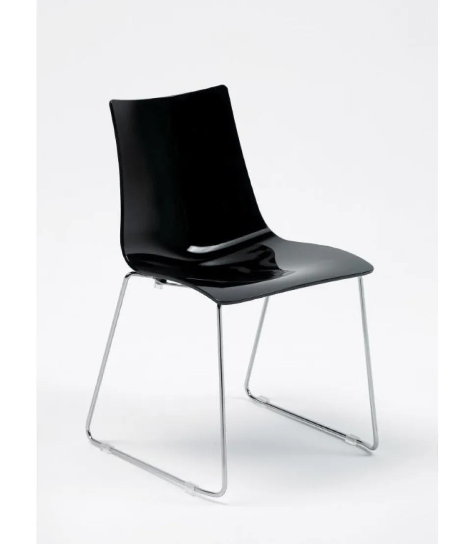 Sedia Zebra Antishock Di Scab, Con Scocca In Policarbonato E Gambe A Slitta In Acciaio Cromato.