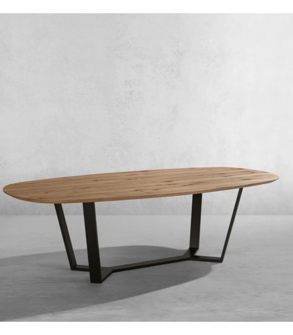 Tavolo Fisso Con Piano Ellittico Bisellato Impiallacciato Su Listellare. Realizzato In Italia Da Pizzolato.