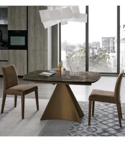 Tornado, Tavolo Con Piano Girevole Ed Allunghe Laterali In Gres Porcellanato.